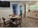 Eat-in kitchen includes dining table, access to living and bed rooms, and updated kitchen at 2222 12Th Nw St, Winter Haven, FL 33881