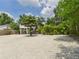 Inviting two-story home with ample parking and lush tropical landscaping in a desirable location at 2222 12Th Nw St, Winter Haven, FL 33881