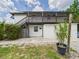 Exterior view of the property showing the backyard and second floor porch at 2222 12Th Nw St, Winter Haven, FL 33881