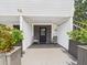 Cozy front entrance featuring a covered porch with rocking chairs and decorative planters at 2222 12Th Nw St, Winter Haven, FL 33881