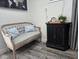 Cozy living area with stylish furnishings, cabinet, and wood-look floors at 2222 12Th Nw St, Winter Haven, FL 33881