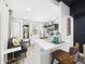 Open concept design with living space adjacent to the kitchen area at 2222 12Th Nw St, Winter Haven, FL 33881