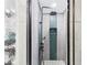 Modern walk-in shower featuring a sleek design, new fixtures, and tiled walls at 2222 12Th Nw St, Winter Haven, FL 33881