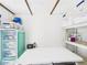 Photo highlighting the room used for storage with shelves and storage bins for organization and space at 2222 12Th Nw St, Winter Haven, FL 33881