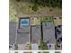Aerial view of a neighborhood with homes and pools, showcasing community layout and amenities at 2356 Palm Park Loop, Clermont, FL 34714