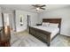 Spacious bedroom features neutral walls, ceiling fan, and carpeted floors at 2356 Palm Park Loop, Clermont, FL 34714