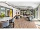 Community lounge with stylish seating, decorative lighting, and a modern design with wood flooring at 2356 Palm Park Loop, Clermont, FL 34714