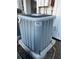 Exterior shot of a home air conditioner on a concrete pad at 2516 Woodgate Blvd # 205, Orlando, FL 32822