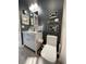 Modern bathroom featuring sleek vanity and updated fixtures at 2516 Woodgate Blvd # 205, Orlando, FL 32822