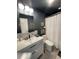 Modern bathroom featuring sleek vanity and updated fixtures at 2516 Woodgate Blvd # 205, Orlando, FL 32822