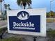 Dockside Condominiums community sign in an attractive design at 2516 Woodgate Blvd # 205, Orlando, FL 32822