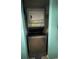 Stacked washer and dryer unit in a convenient closet at 2516 Woodgate Blvd # 205, Orlando, FL 32822