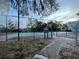 Enjoy a game of tennis on the community tennis court at 2516 Woodgate Blvd # 205, Orlando, FL 32822