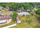 Aerial view of a property showcasing the home, backyard and surrounding neighborhood at 2640 Handley Blvd, Lakeland, FL 33803