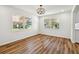 Bright dining area with wood floors and large windows, perfect for Gathering meals at 2640 Handley Blvd, Lakeland, FL 33803