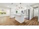 Modern kitchen featuring white cabinets, stainless steel appliances, and a central island at 2640 Handley Blvd, Lakeland, FL 33803