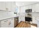 Well-equipped kitchen with white cabinets, stainless steel appliances, and a subway tile backsplash at 2640 Handley Blvd, Lakeland, FL 33803