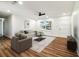 Inviting living room with wood floors, comfortable seating, and ample natural light at 2640 Handley Blvd, Lakeland, FL 33803