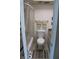 Compact bathroom with a shower-tub combination, toilet, vanity, and neutral tile, optimizing functionality in a small space at 266 Las Flores, Winter Haven, FL 33884