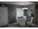 Dining room featuring a glass table and art on wall at 266 Las Flores, Winter Haven, FL 33884