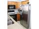 Kitchen showing appliances and granite countertops at 266 Las Flores, Winter Haven, FL 33884