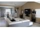 Bright living room with tile flooring, modern decor, and open layout to a dining area at 266 Las Flores, Winter Haven, FL 33884