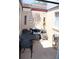 Outdoor patio area featuring furniture, decor, and a grill at 266 Las Flores, Winter Haven, FL 33884