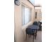 Patio seating area with metal table and chairs at 266 Las Flores, Winter Haven, FL 33884