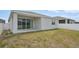 Spacious backyard with well-maintained grass and a privacy fence at 287 Lake Smart Cir, Winter Haven, FL 33881