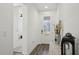 Inviting foyer with a decorative glass front door and stylish decor at 287 Lake Smart Cir, Winter Haven, FL 33881