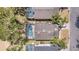 Aerial view of home with a screened-in pool; one of many homes near the golf course at 2960 Kokomo Loop, Haines City, FL 33844