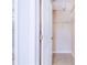 Walk in closet featuring tile flooring, walls, and wire shelving at 2960 Kokomo Loop, Haines City, FL 33844