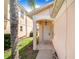Charming front porch with a welcoming entrance and manicured landscaping at 2960 Kokomo Loop, Haines City, FL 33844