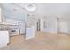 Open living space with tile floors, light walls, and bright natural light at 2960 Kokomo Loop, Haines City, FL 33844