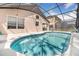 Inviting screened-in pool area, perfect for relaxation and entertaining at 2960 Kokomo Loop, Haines City, FL 33844