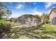 Private screened-in pool with a clear blue pool, offering a serene backyard retreat with ample space for relaxation at 2960 Kokomo Loop, Haines City, FL 33844