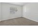 Bedroom featuring neutral color scheme, carpeted floor, window, and closet at 3022 Lantana Rd, Auburndale, FL 33823