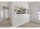 Open kitchen design with bar counter, stainless appliances, and convenient access to other rooms at 3022 Lantana Rd, Auburndale, FL 33823