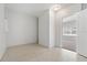 Bonus room with light walls and floors and an entrance to another room at 3022 Lantana Rd, Auburndale, FL 33823