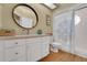 Bathroom featuring wood-look floors, vanity with granite countertops, and shower with curtain at 3158 Beauchamp Ct, Winter Haven, FL 33884