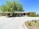 Exterior view of community clubhouse with covered entrance and ample parking at 3158 Beauchamp Ct, Winter Haven, FL 33884