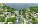 An aerial of the residence featuring a pool and proximity to the tranquil lake at 333 Lake Otis Se Dr, Winter Haven, FL 33880