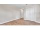 Bedroom featuring wood floors, natural light, base trim and a bi-fold closet at 333 Lake Otis Se Dr, Winter Haven, FL 33880