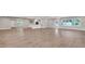 Spacious living area with modern floors, bright light, and open design for entertaining at 333 Lake Otis Se Dr, Winter Haven, FL 33880
