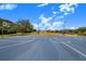 Full basketball court with lights near other community amenities at 3374 Waterlute Way, Lakeland, FL 33811