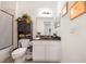 Bathroom with tile floor, granite counters, and shower at 3374 Waterlute Way, Lakeland, FL 33811