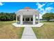 Picturesque gazebo in a community park, perfect for relaxation and outdoor enjoyment at 3374 Waterlute Way, Lakeland, FL 33811