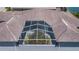 Aerial view of the screened-in patio with a lush tropical courtyard and offering ample outdoor space at 3374 Waterlute Way, Lakeland, FL 33811