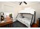 Efficient bedroom offers a cozy space with a bunk bed and dedicated study area at 418 E 10Th Ave, Mount Dora, FL 32757