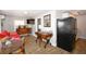 Inviting living space showcasing an efficient layout with a dining area, desk space, and a kitchenette at 418 E 10Th Ave, Mount Dora, FL 32757